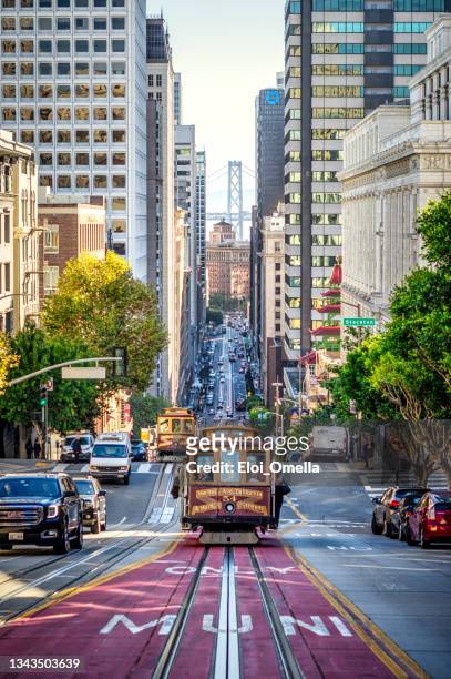 san francisco cable cars on california street at sunrise, california, usa - lombard street san francisco stock pictures, royalty-free photos & images
