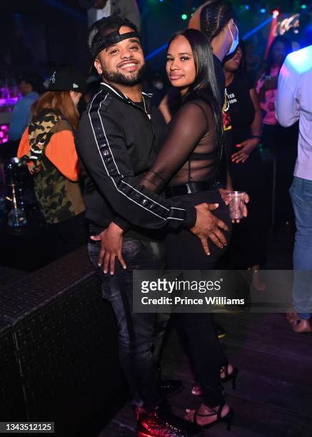 Raz-B and Guest attend Anthony Hamilton "Love Is The New Black" Listening Party at Republic Lounge on September 22, 2021 in Atlanta, Georgia.