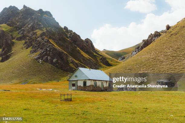 abandoned farm in the mountains of tian shan - mongolian culture stock pictures, royalty-free photos & images