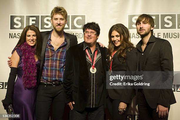Anna Wilson, Charles Kelley, Monty Powell, Hillary Scott, and Dave Haywood of Lady Antelbellum attend the 2010 SESAC Nashville Music awards dinner at...