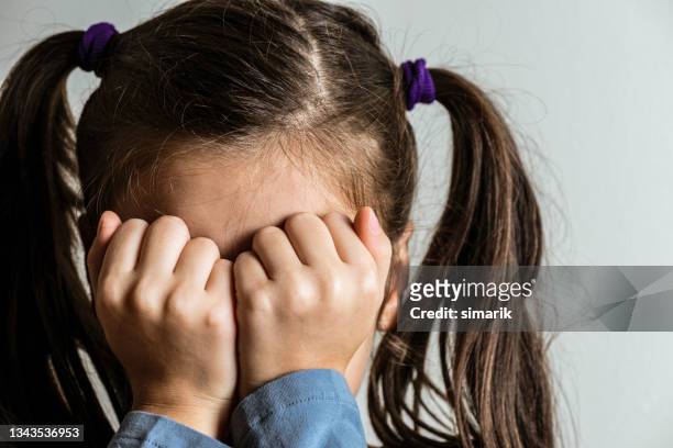 crying girl - abused girl stock pictures, royalty-free photos & images