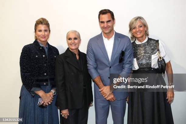 Stylist Maria Grazia Chiuri , Roger Federer , his wife Miroslava Vavrinec and Helene Arnault attend the Dior Womenswear Spring/Summer 2022 show as...