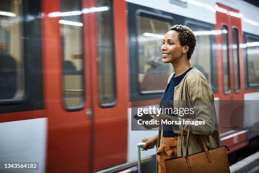 Confident businesswoman at subway station Confident businesswoman at subway station