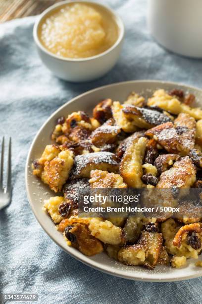 high angle view of food in plate on table - kaiserschmarrn stock pictures, royalty-free photos & images