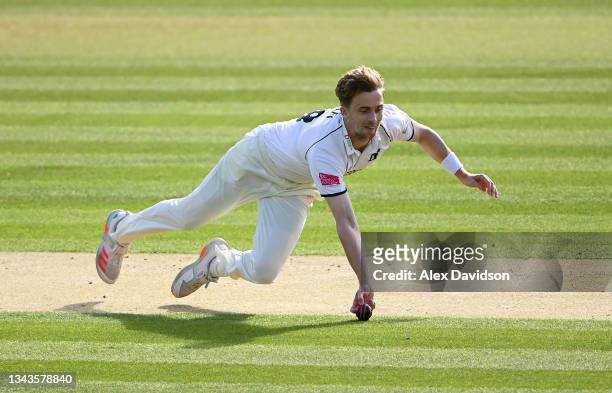 Craig Miles of Warwickshire takes the catch to dismiss Alex Davies of Lancashire during Day 1 of the Bob Willis Trophy Final match between...