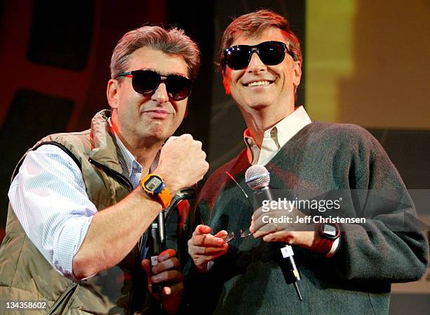 Nick Hayek Jr., CEO of Swatch Group, and Bill Gates, chairman Microsoft Chairman/chief Software Architect, show the new watch line called "Paparazzi"...