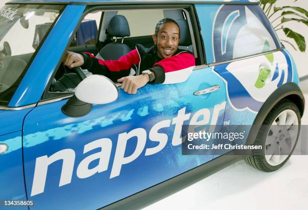 Def Jam recording artist Ludacris sits in the Napster car during a press event October 9, 2003 in New York. Napster, a division of Roxio announced...