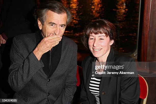 French philosopher Bernard-Henri Levy and Fadela Amara attend SOS Racisme Party on the Maxim's barge on January 28, 2008 in Paris, France.