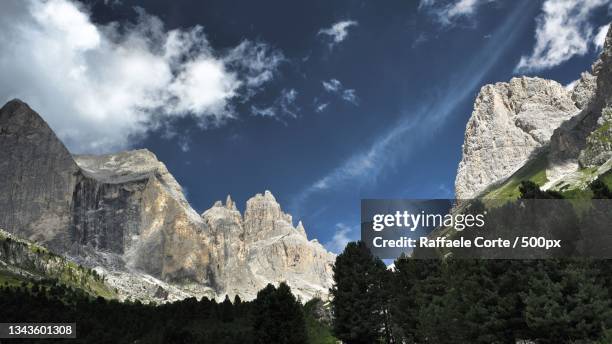 low angle view of rock formation against sky - raffaele corte stock pictures, royalty-free photos & images