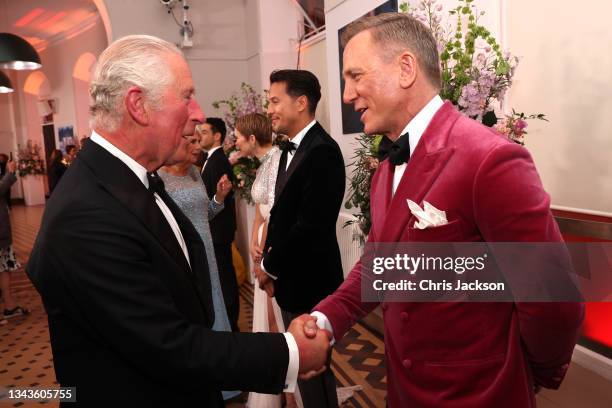 Prince Charles, Prince of Wales meets some of the cast including Daniel Craig, at the "No Time To Die" World Premiere at Royal Albert Hall on...
