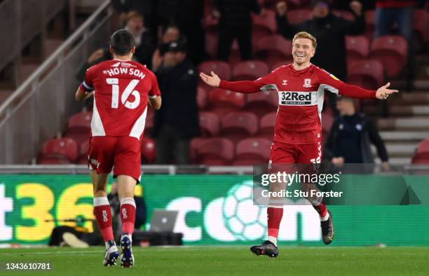 Duncan Watmore of Middlesbrough celebrates after scoring their sides first goal during the Sky Bet Championship match between Middlesbrough and...