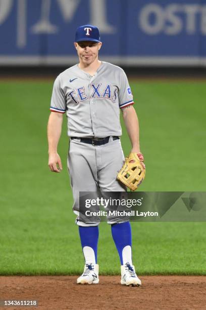 Brock Holt of the Texas Rangers looks on during a baseball game against the Baltimore Orioles at Oriole Park at Camden Yards on September 24, 2021 in...