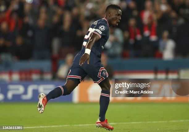 Idrissa Gueye of Paris Saint-Germain celebrates after scoring his team's first goal during the UEFA Champions League group A match between Paris...