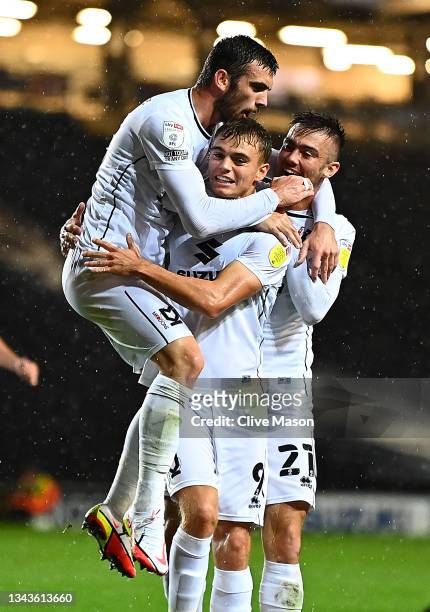 Scott Twine of MK Dons celebrates his goal during the Sky Bet League One match between Milton Keynes Dons and Fleetwood Town at Stadium mk on...