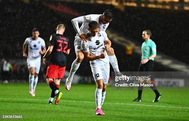 Scott Twine of MK Dons celebrates his goal during the Sky Bet League One match between Milton Keynes Dons and Fleetwood Town at Stadium mk on...