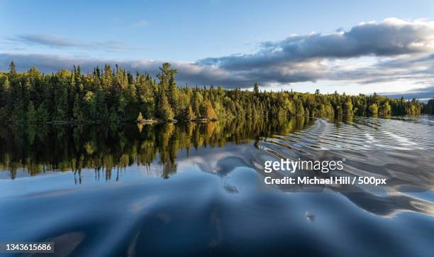 scenic view of lake against sky,timiskaming,ontario,canada - ontario canada stock pictures, royalty-free photos & images