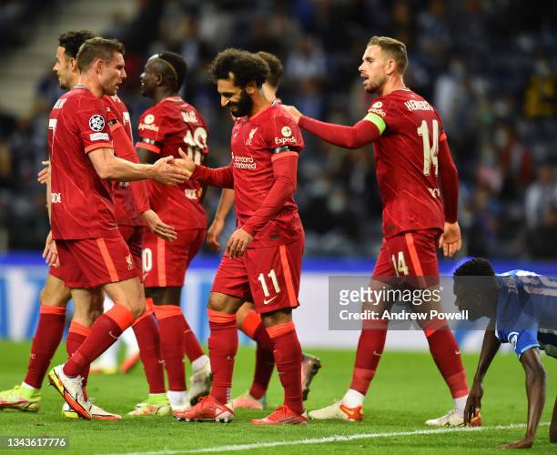Mohamed Salah of Liverpool celebrates after scoring the first goal during the UEFA Champions League group B match between FC Porto and Liverpool FC...