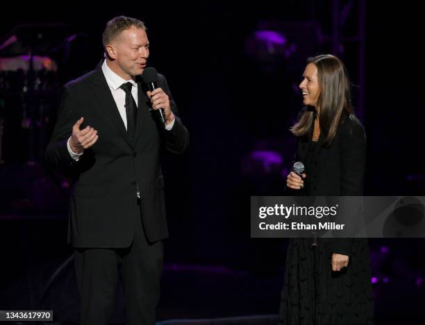 Actor/comedian and host Gary Owen speaks with Turn up for Recovery founder Melia Clapton during Mobile Recovery's Recover Out Loud concert at the...