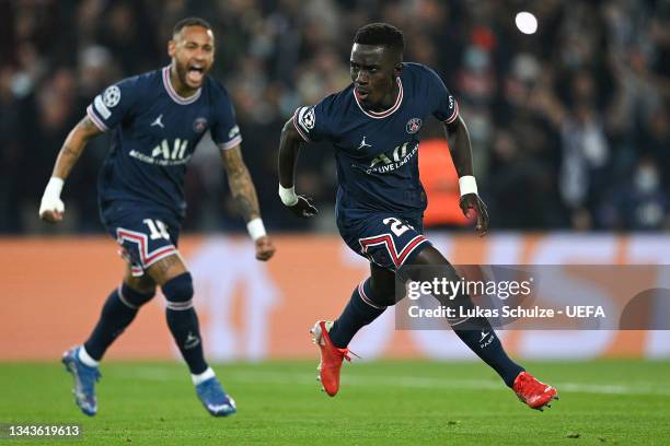 Idrissa Gueye of Paris Saint-Germain celebrates after scoring their sides first goal during the UEFA Champions League group A match between Paris...