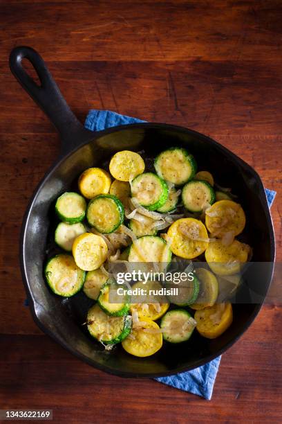 zucchini onion skillet - courgette stock pictures, royalty-free photos & images