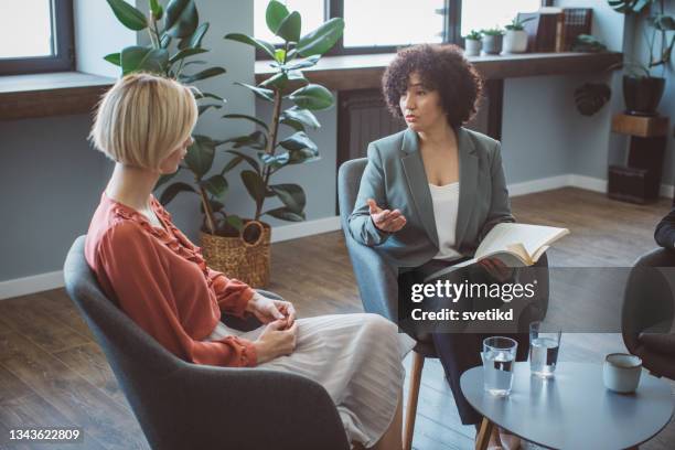 meeting with book publisher - editor imagens e fotografias de stock