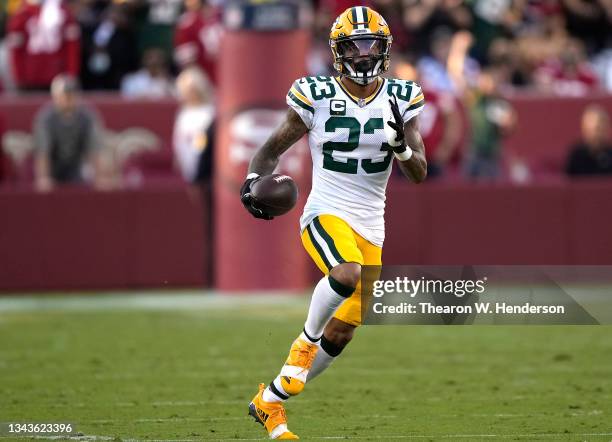 Jaire Alexander of the Green Bay Packers runs after intercepting a pass during the first half against the San Francisco 49ers in the game at Levi's...