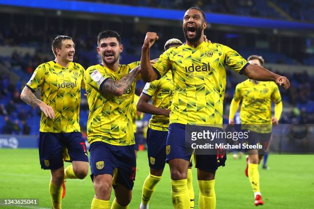 Matt Phillips of West Bromwich Albion celebrates with team mate Alex Mowatt after scoring their sides fourth goal during the Sky Bet Championship...