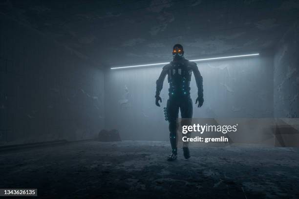 abandoned empty room with cyborg walking - ugliness stockfoto's en -beelden