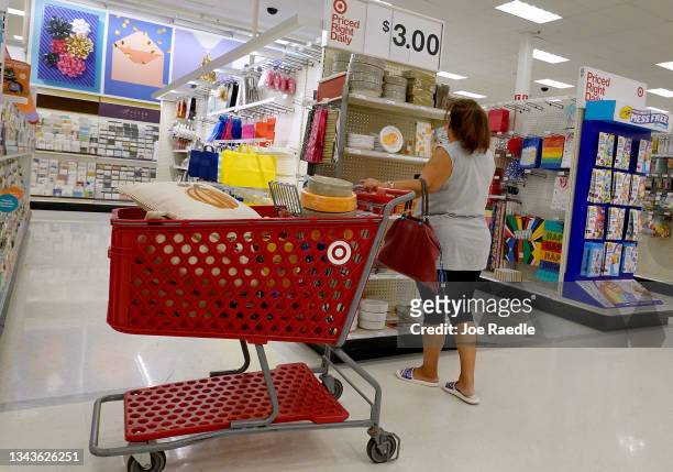 Consumers shop in a Target store on September 28, 2021 in Miami, Florida.The Conference Board's Consumer Confidence Index released today indicated...