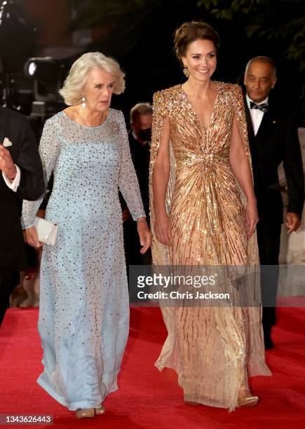 Catherine, Duchess of Cambridge and Camilla, Duchess of Cornwall attend the "No Time To Die" World Premiere at Royal Albert Hall on September 28,...
