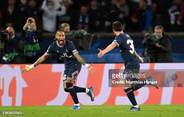 Lionel Messi of Paris Saint-Germain celebrates with team mate Neymar after scoring their sides second goal during the UEFA Champions League group A...