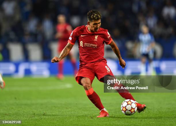 Roberto Firmino of Liverpool scores the fourth goal making the score 1-4 during the UEFA Champions League group B match between FC Porto and...