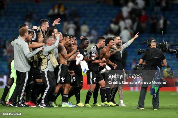 Players of FC Sheriff celebrate after victory in the UEFA Champions League group D match between Real Madrid and FC Sheriff at Estadio Santiago...