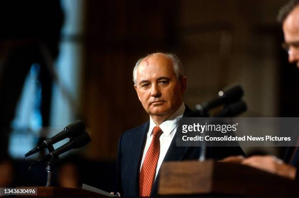 View of a Soviet President Mikhail Gorbachev listens during a press conference at the signing ceremony White House's East Room, Washington DC, June...