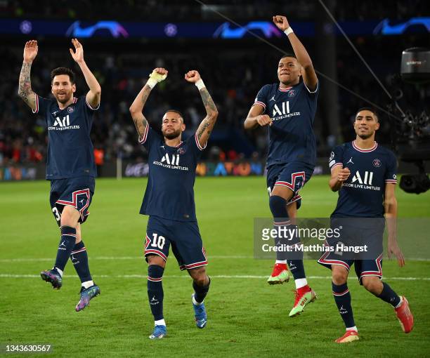 Lionel Messi, Neymar, Kylian Mbappe and Achraf Hakimi of Paris Saint-Germain celebrate after victory in the UEFA Champions League group A match...