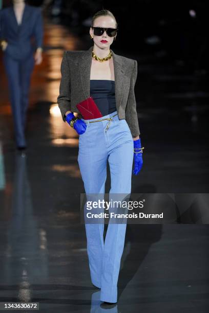Model walks the runway during the Saint Laurent Womenswear Spring/Summer 2022 show as part of Paris Fashion Week on September 28, 2021 in Paris,...