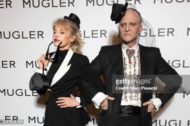Arielle Dombasle and Ali Mahdavi attend the "Thierry Mugler : Couturissime" Photocall as part of Paris Fashion Week at Musee Des Arts Decoratifs on...