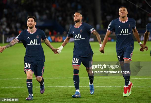 Lionel Messi, Neymar and Kylian Mbappe of Paris Saint-Germain celebrate after victory in the UEFA Champions League group A match between Paris...