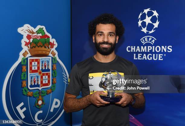 Mohamed Salah of Liverpool with the Champions League Man of the Match award after the UEFA Champions League group B match between FC Porto and...