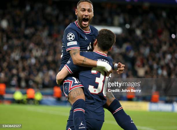 Lionel Messi of PSG celebrates his goal with Neymar Jr of PSG during the UEFA Champions League group A match between Paris Saint-Germain and...