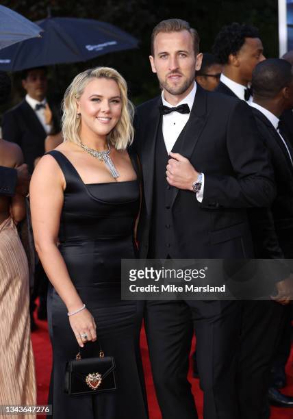 Katie Goodland and Harry Kane attend the "No Time To Die" World Premiere at Royal Albert Hall on September 28, 2021 in London, England.