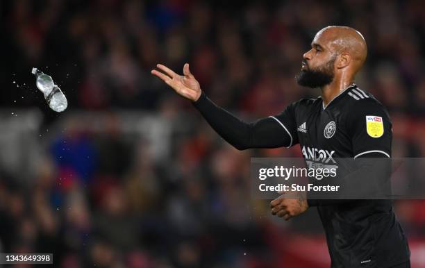 Sheffield United player David McGoldrick throws a water bottle away after taking a drink during the Sky Bet Championship match between Middlesbrough...