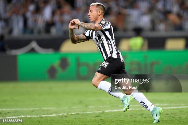 Eduardo Vargas of Atletico Mineiro celebrates after scoring the first goal of his team during a semi final second leg match between Atletico Mineiro...