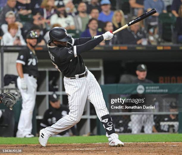 Luis Robert of the Chicago White Sox hits a two run home run in the 8th inning against the Cincinnati Reds at Guaranteed Rate Field on September 28,...