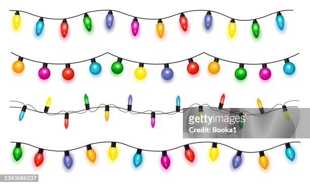 colorful christmas light background - floral garland stock illustrations