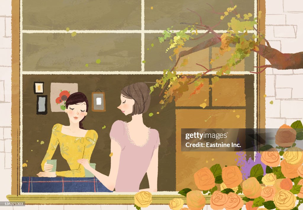 Two woman having coffee