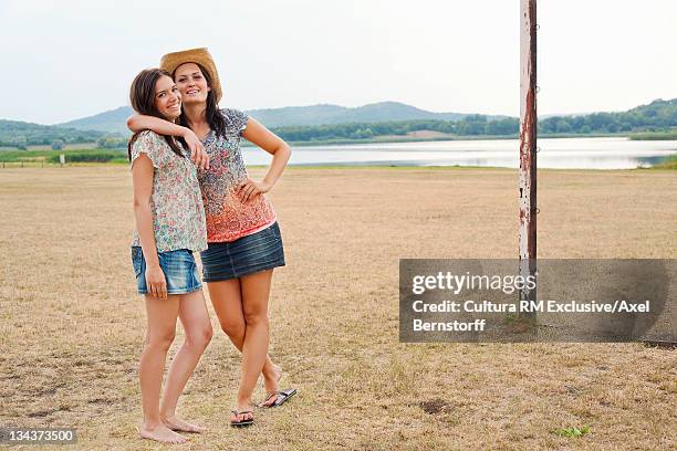 women hugging in field - viewpoint balaton stock pictures, royalty-free photos & images