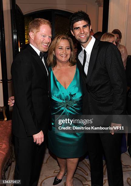 Actor Jesse Tyler Ferguson, Hilary Rosen and Justin Mikita attend the Bloomberg & Vanity Fair cocktail reception following the 2011 White House...
