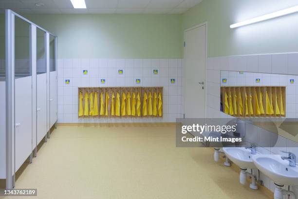 modern day care nursery or pre-school kindergarten, spacious interiors, washroom and storage - estonia school stock pictures, royalty-free photos & images