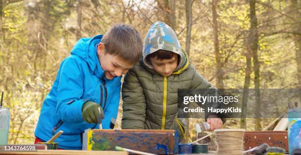 students making a wooden box - paint preparation stock pictures, royalty-free photos & images